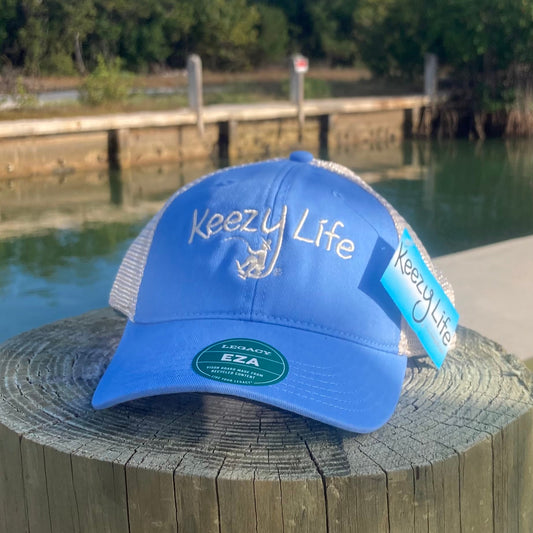 Powder Blue trucker cap says Keezy Life. The letter Y has a boy fishing on the bottom of the Y.
